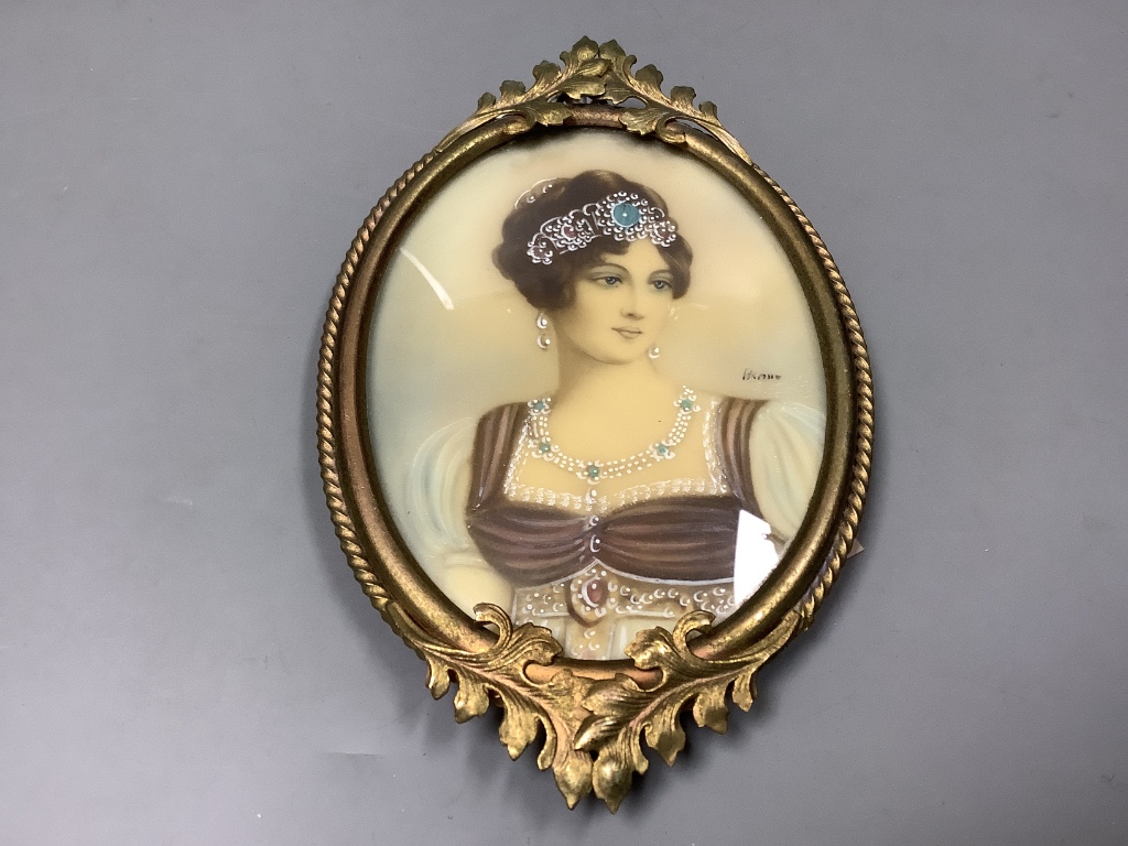 A portrait miniature of a lady, in a brass frame